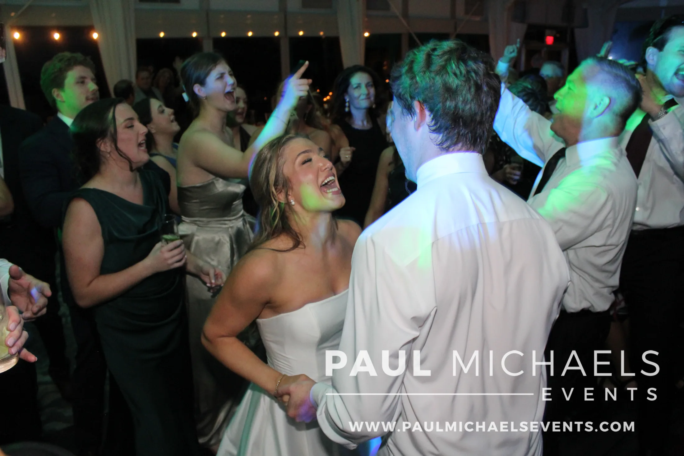 A wedding DJ setup beside the dance floor at The Monte Bello Estate in Lemont.