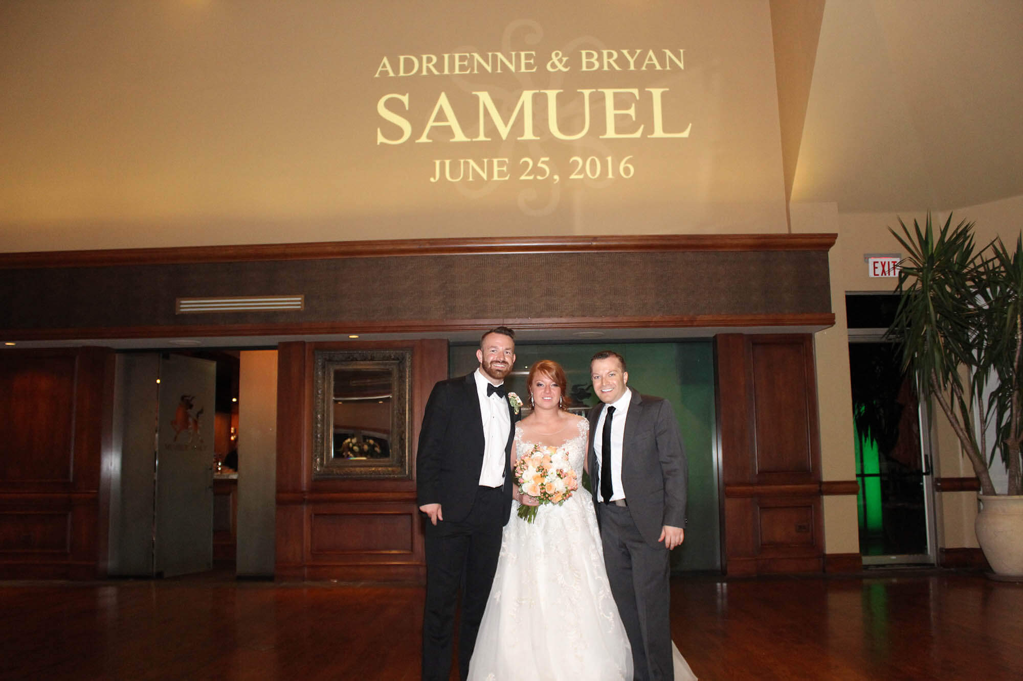 DJ Paul with Adrienne and Bryan at their wedding in Woodstock IL