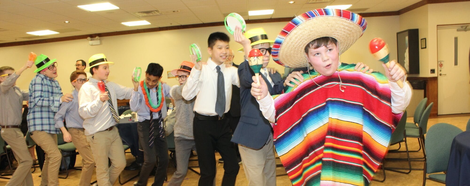 kids dancing in conga line at Bar Mitzvah