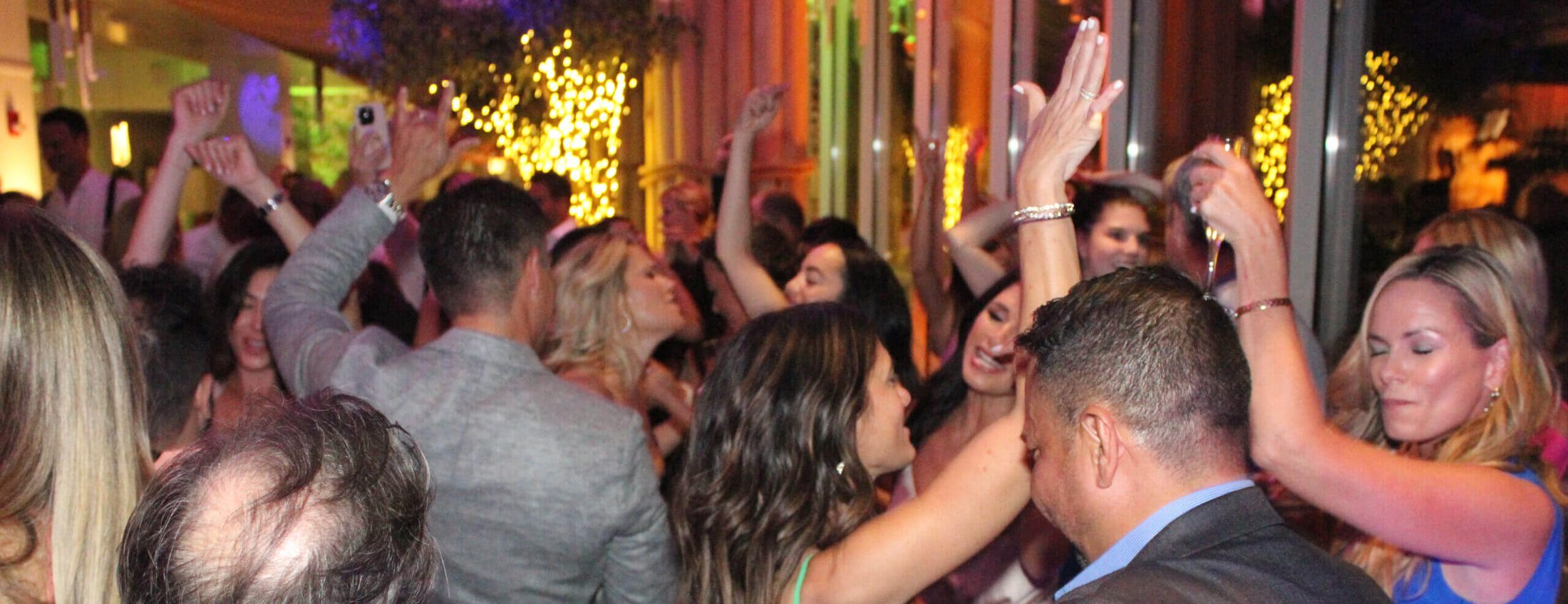 Dance floor full of dancing guest at Avli on the Park, dancing to music by the best Chicago DJ Entertainment Services, Paul Michaels Events