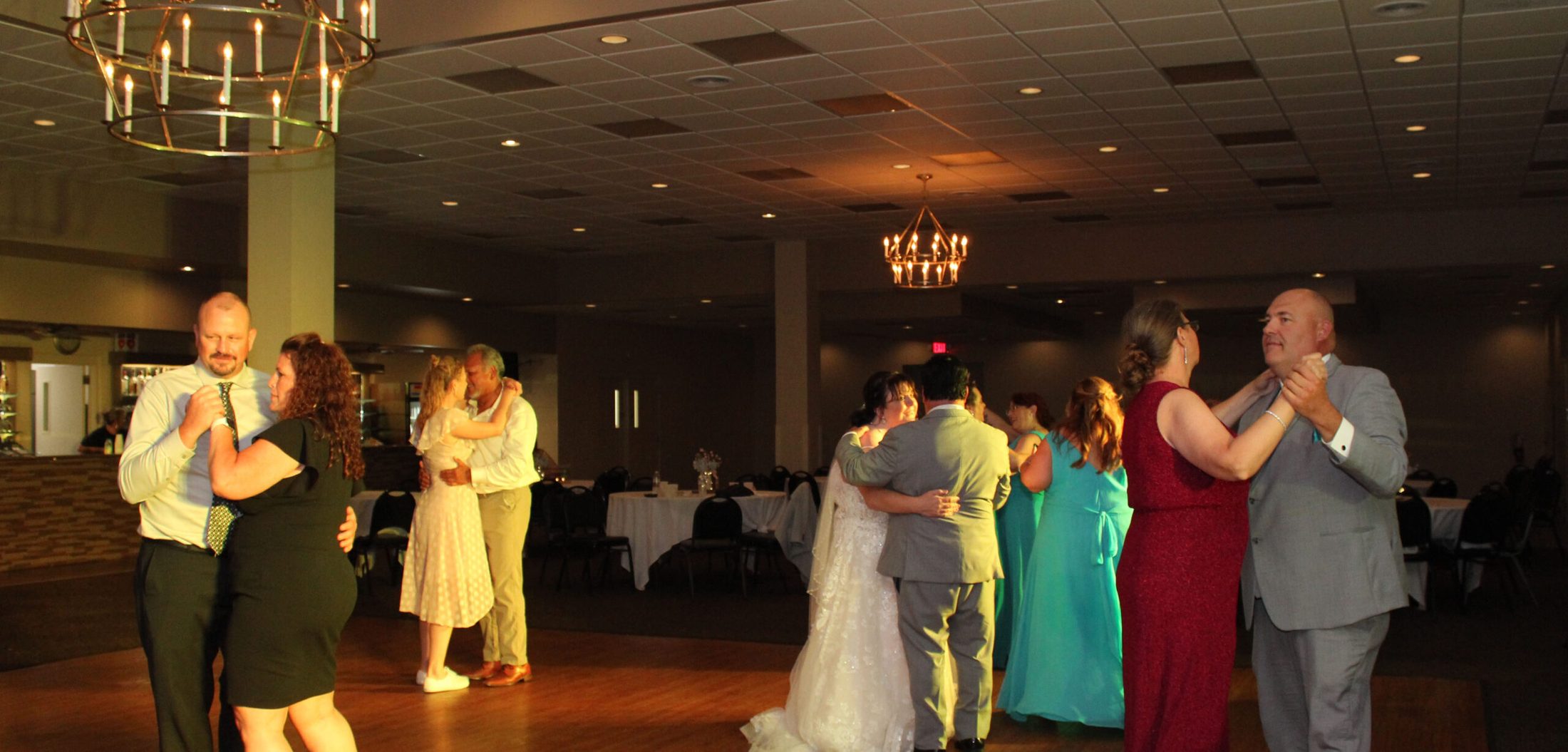 Couples slow dancing to hits by the best DJ company in the Chicago suburbs