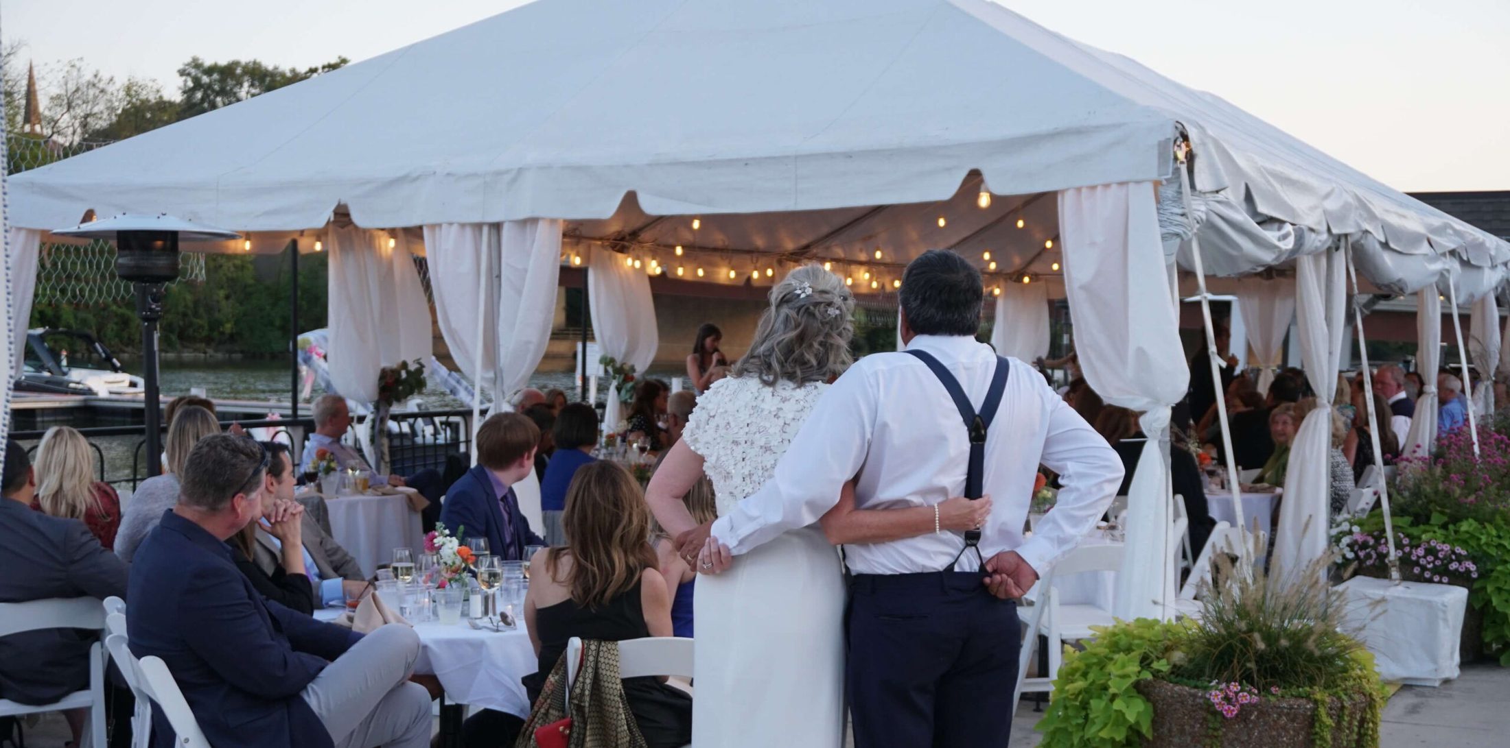 Bride and groom with arms around