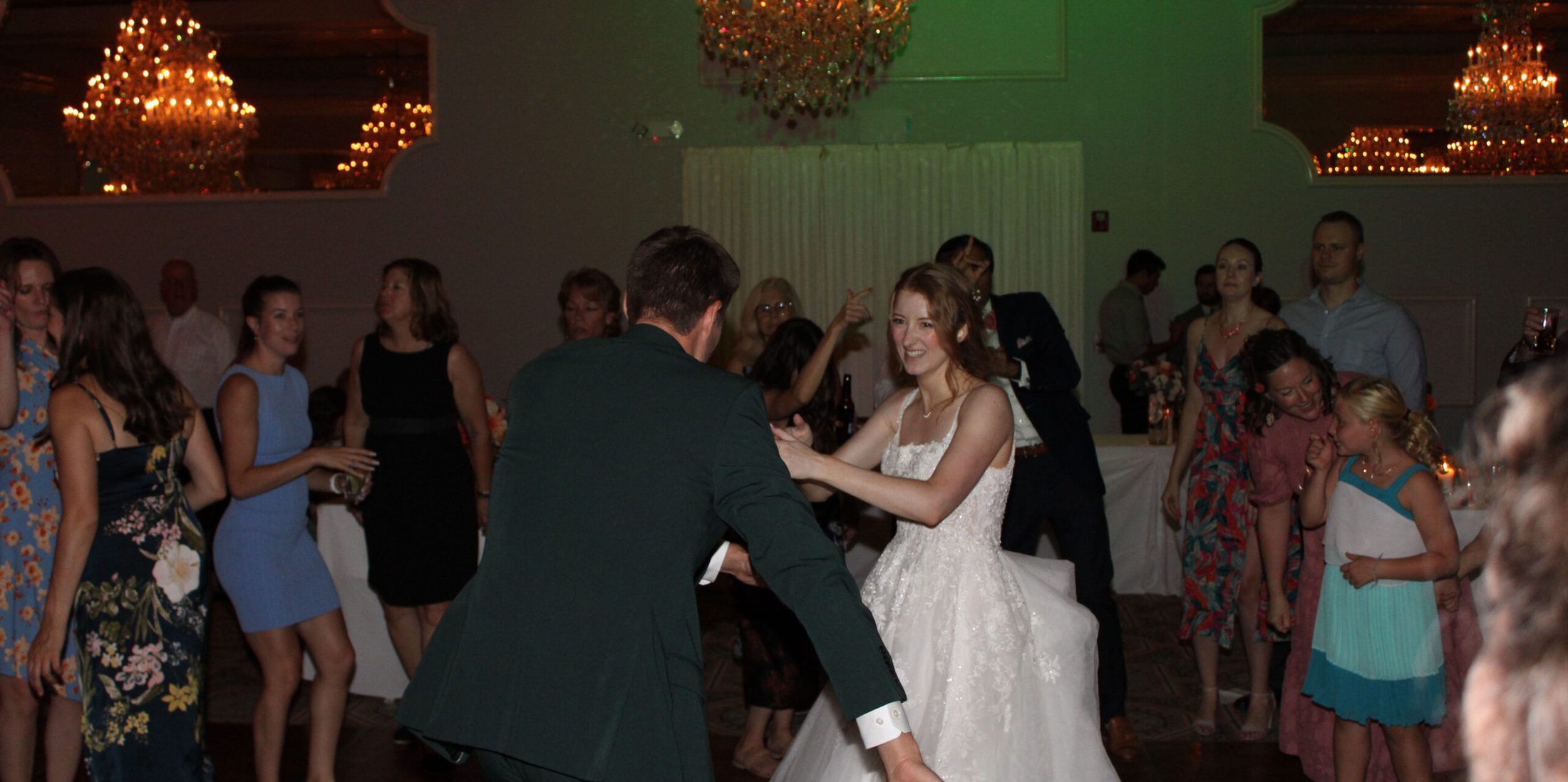 Bride and groom dancing to music